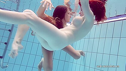 Super hot underwater girls stripping and...