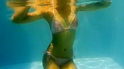 Two asian bikini underwater...