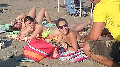 Spanish chicks seduced beach...